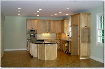 Kitchen - Featuring Shaker Maple Cabinetry and Black Granite Island!